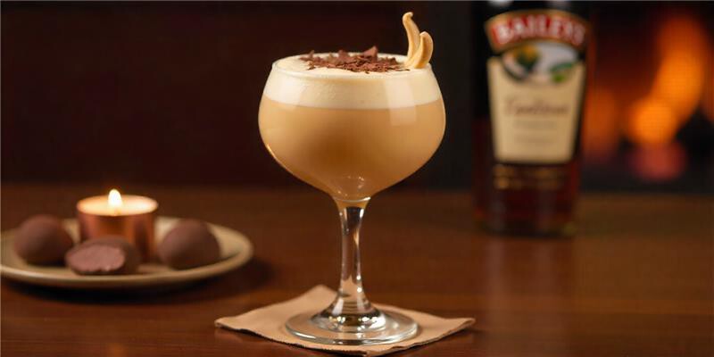 freepik__a-gobletstyle-cocktail-glass-filled-with-a-creamy-__24471.png