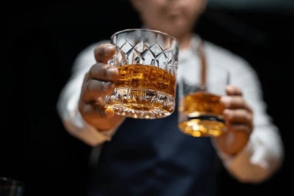 businessmen-suits-drinking-celebrate-whiskey-600nw-2429001155_image