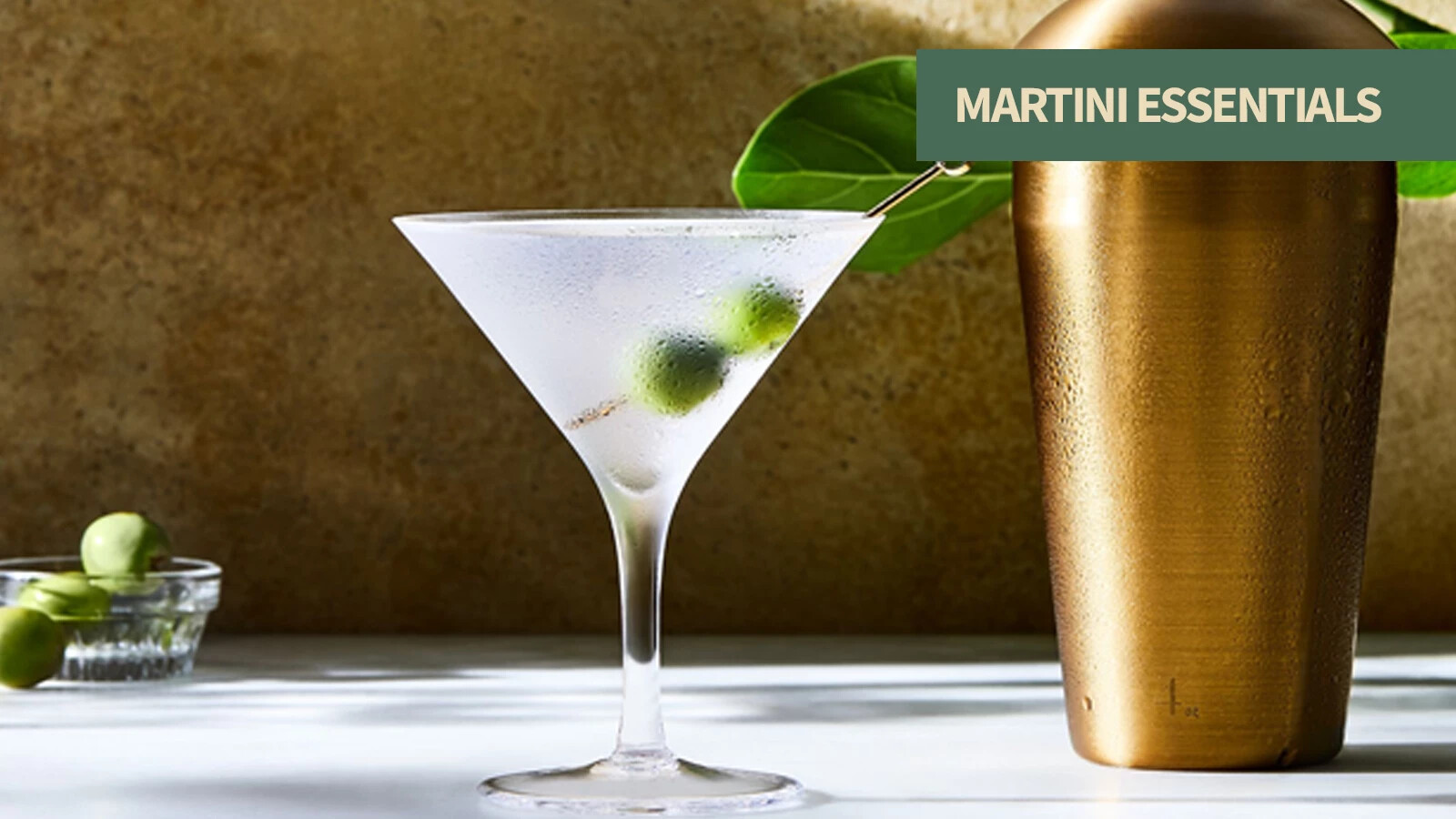 Martini essentials including premium vermouth, glassware, garnishes, and bar tools for a colder, cleaner Martini.