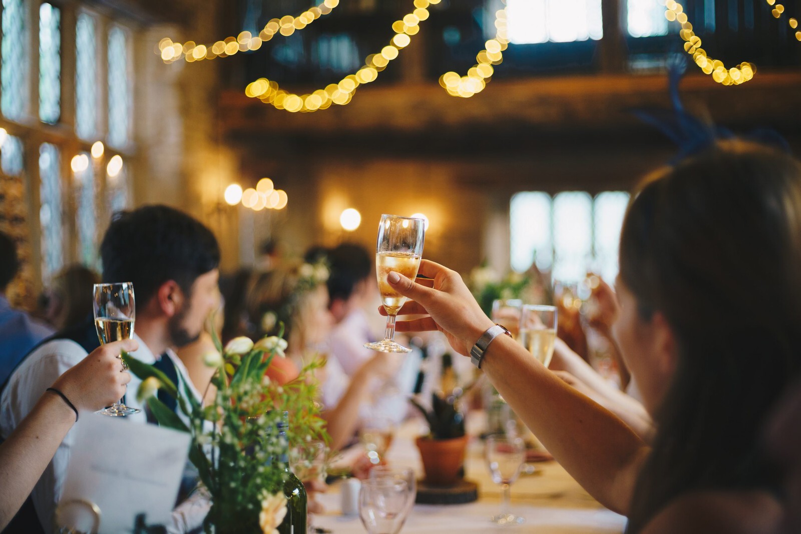 people toasting at a wedding