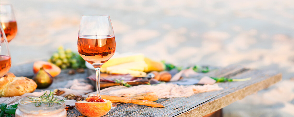 sunrise-cellars-banner-rose-glass-peaches.jpg
